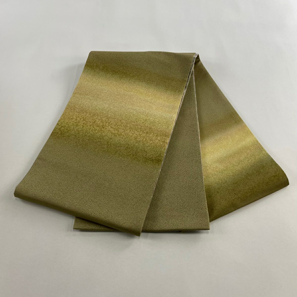 【美品】 袋帶 秀品級 霞 幾何學 茶綠 お太鼓圖案 純蠶絲