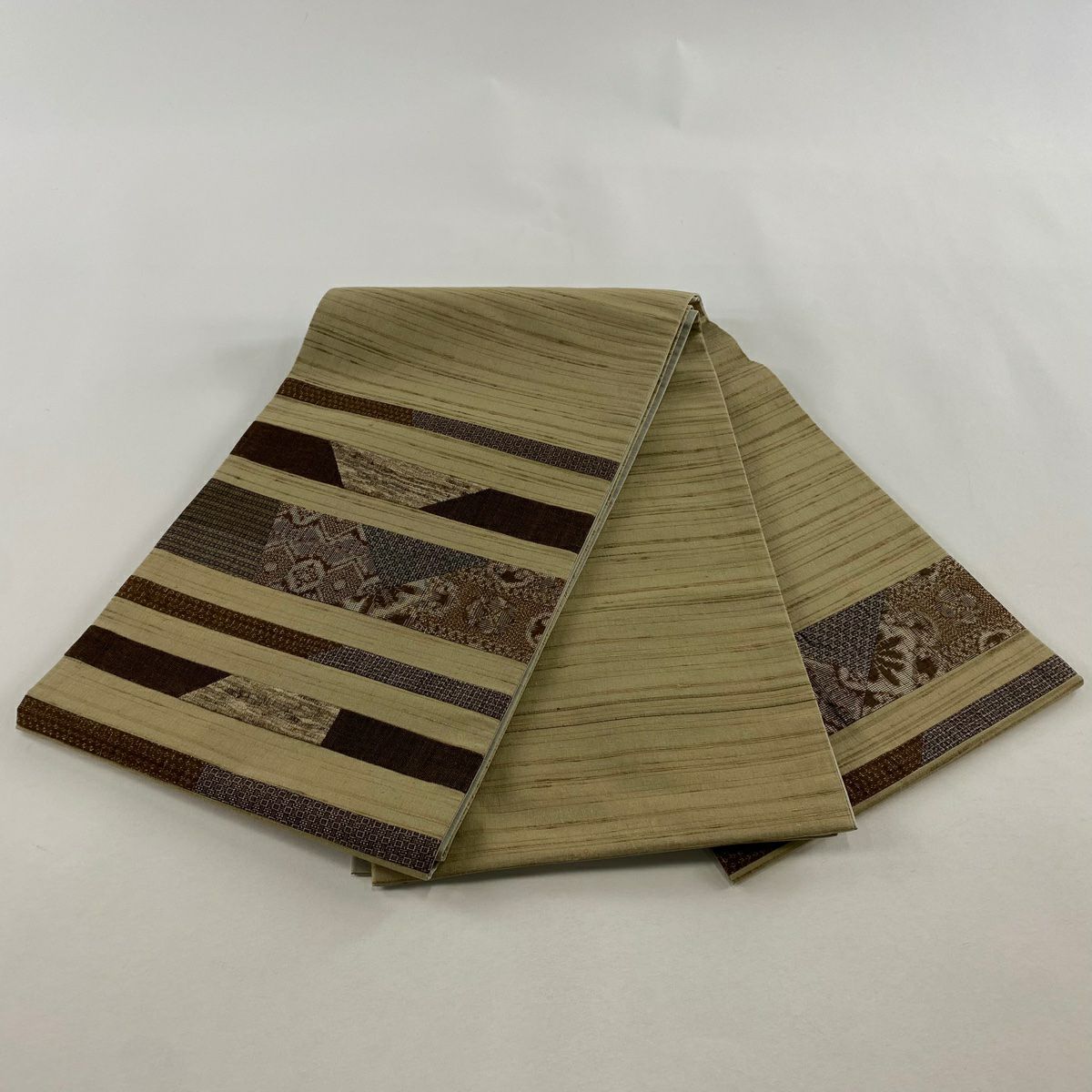 【美品】 袋帶 名品級 紬織織 段紋 幾何圖案 切嵌 薄茶 金銀彩 純蠶絲