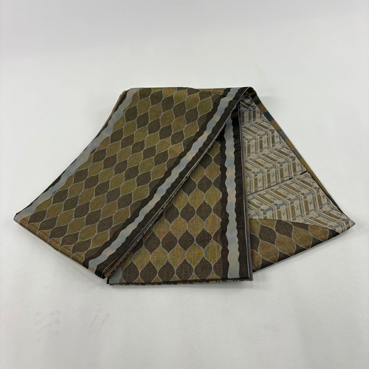 【美品】 袋帶 名品級 手先二通り 幾何學 金絲 金茶 お太鼓紋 純蠶絲