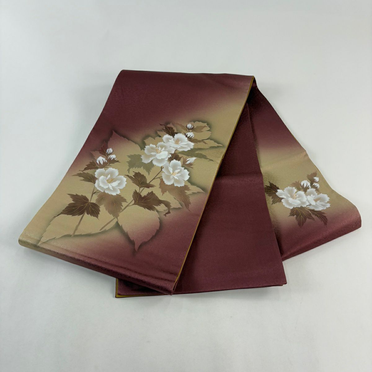 袋帶 名品級 丹下雄介 落款 あり 大和 草花紋 輪廓 金彩裝飾 紅紫 お太鼓圖案 純蠶絲