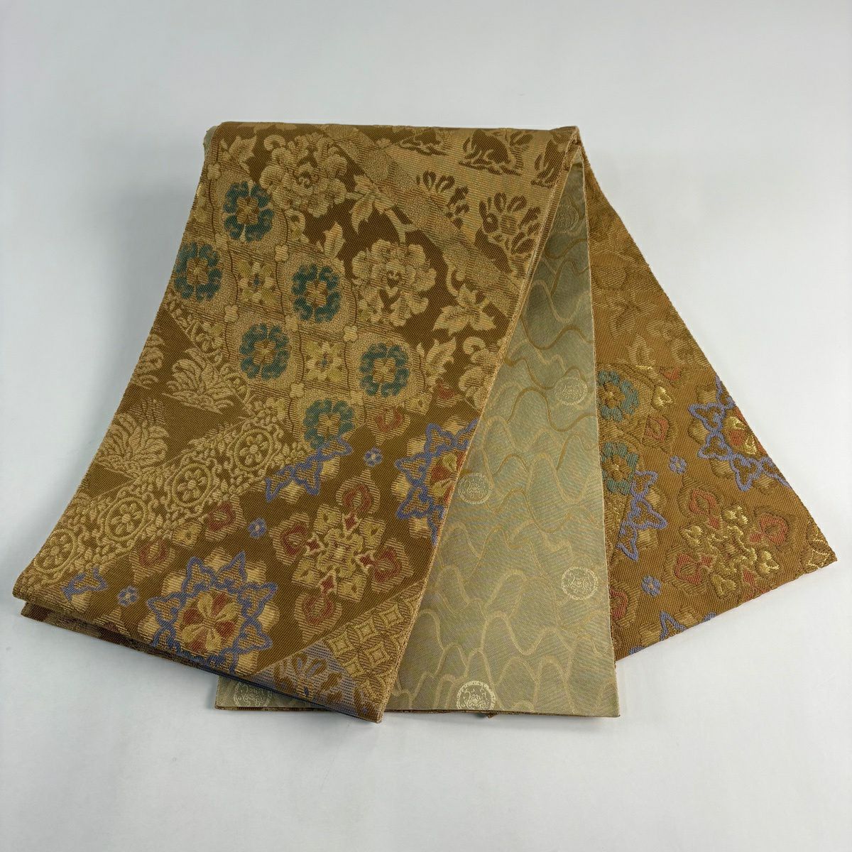 【美品】 袋帶 名品級 華紋 鶏頭 輪奈織 金糸 山吹茶 紅色 お太鼓柄 純蠶絲