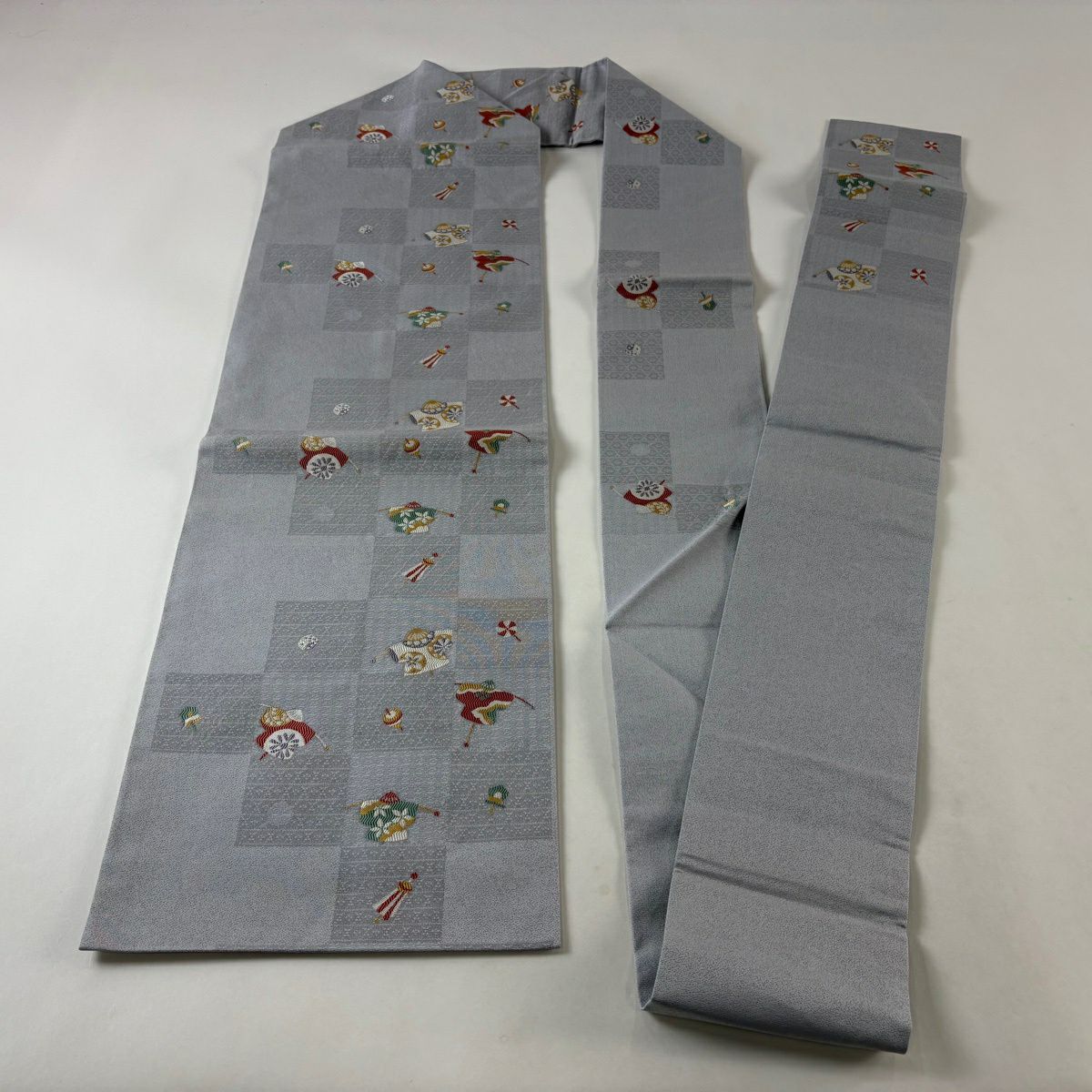 【美品】 名古屋帶 名品級 風車 独樂 灰色 純蠶絲