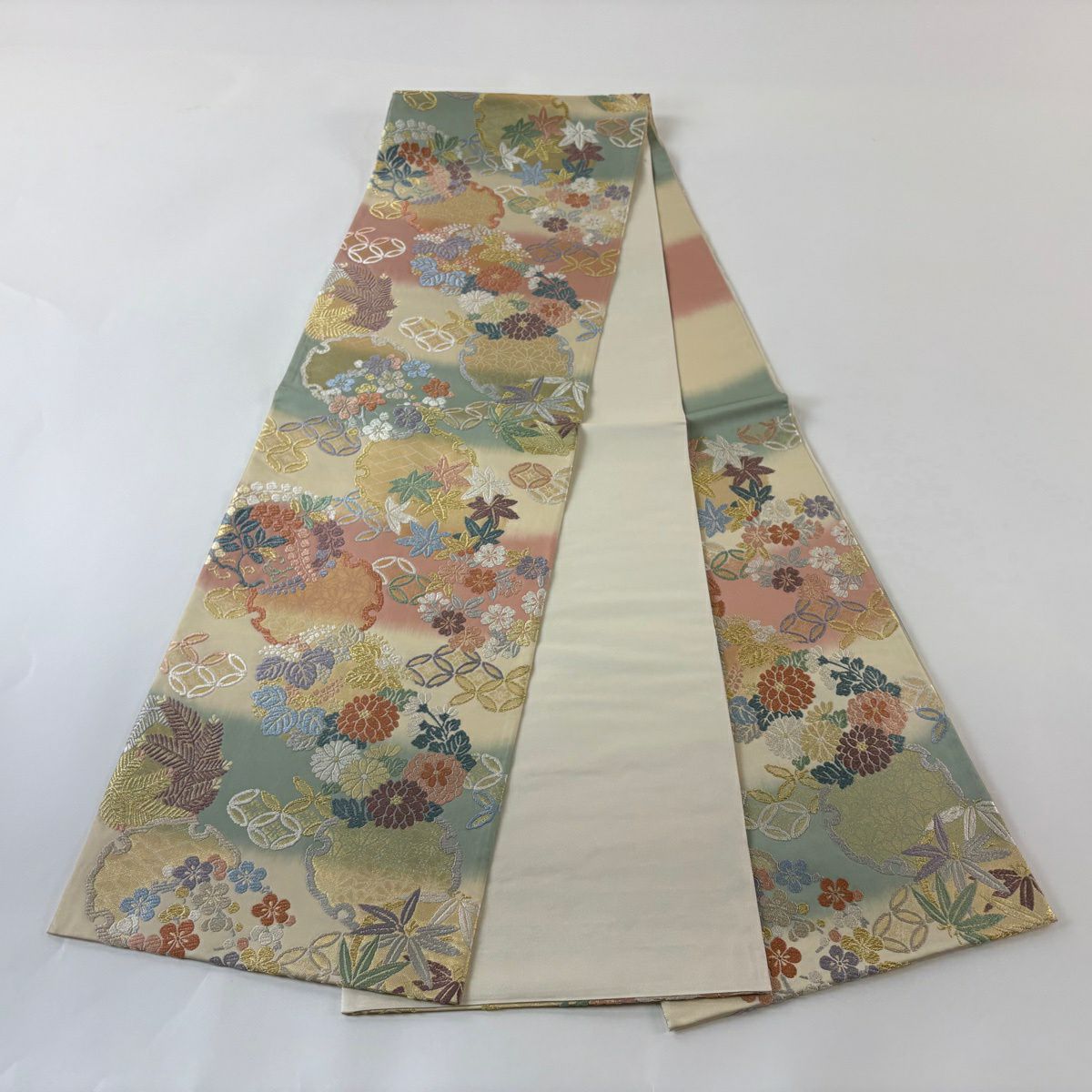 【美品】 袋帶 名品級 雪輪 花丸紋 唐織 金絲 奶油色 六通 純蠶絲