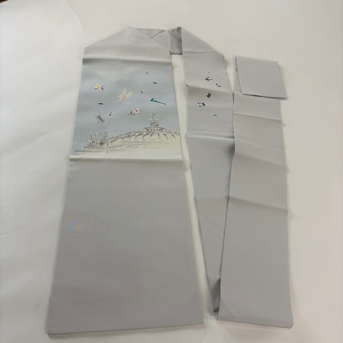 名古屋帶 逸品級 建築 音符 金銀彩 水色 純蠶絲