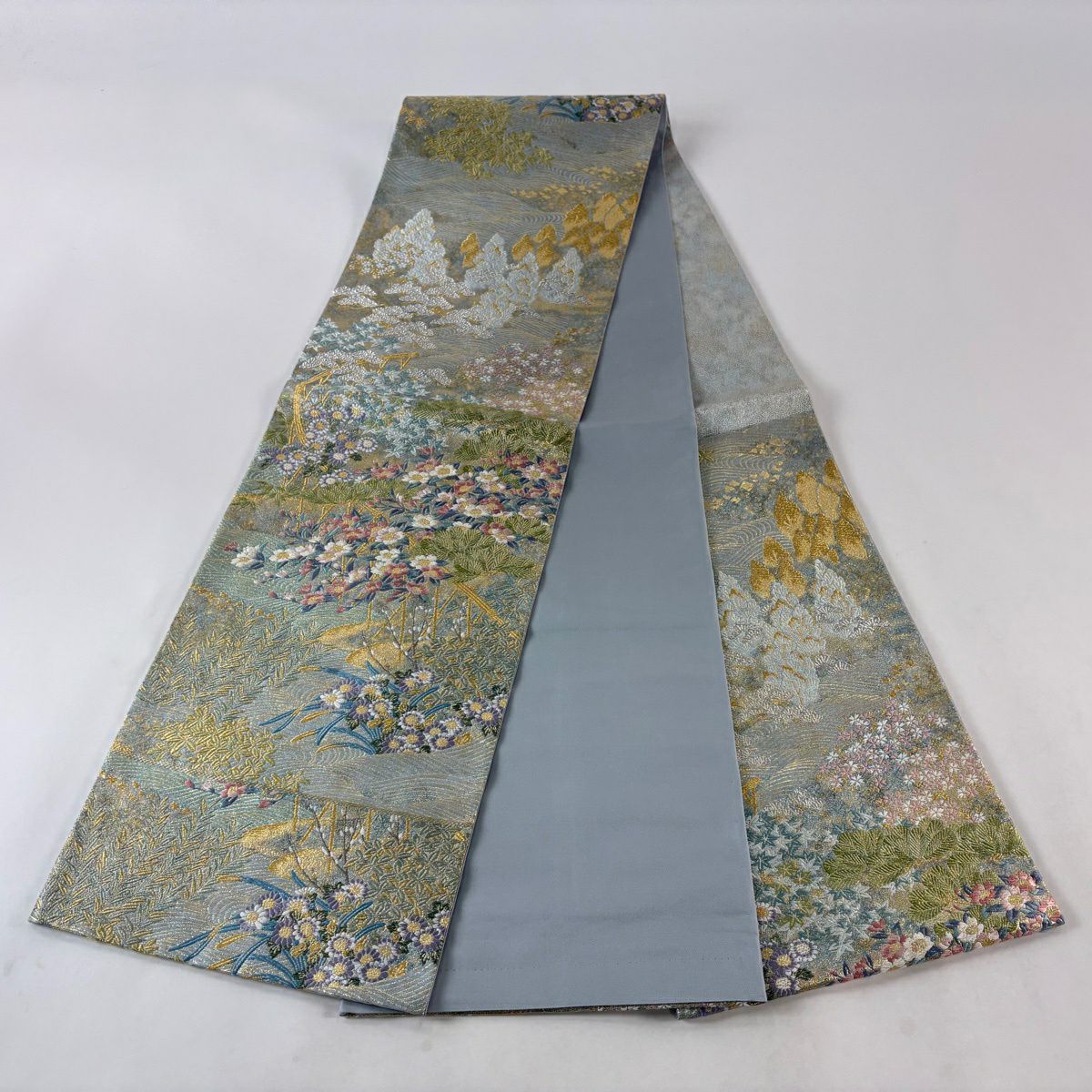 【美品】 袋帶 秀品級 夏帶 草花紋 若松樹 唐織 金銀彩 水藍 六通 純蠶絲