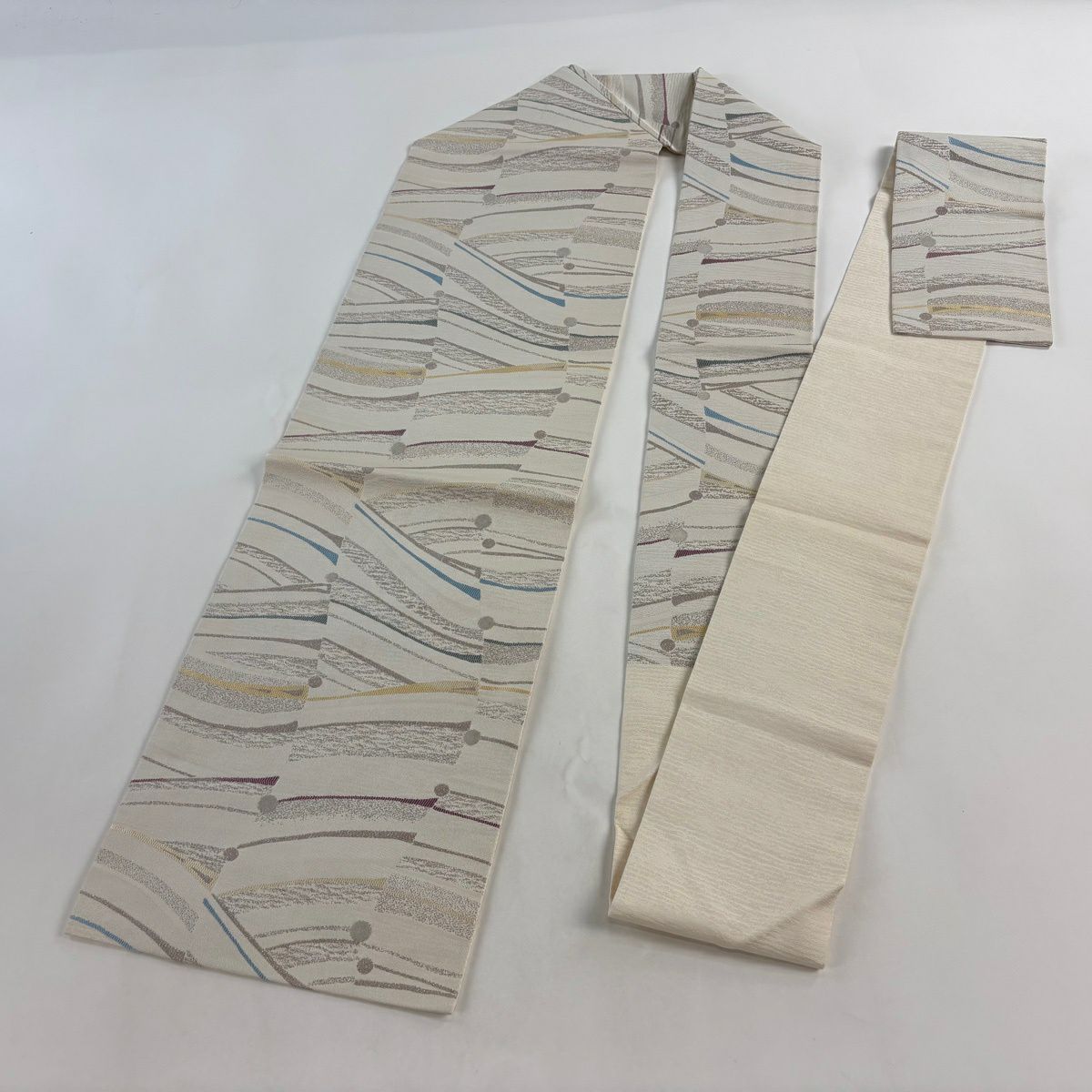 【美品】 名古屋帶 名品級 幾何學 銀糸 米色 純蠶絲