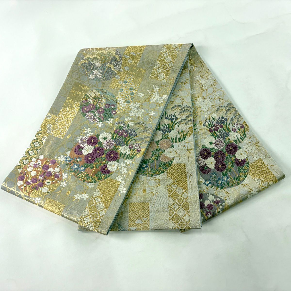 【美品】 袋帶 逸品級 古代帝王紫 草花紋紋 有職文樣 唐織 金絲 灰色 お太鼓柄 純蠶絲
