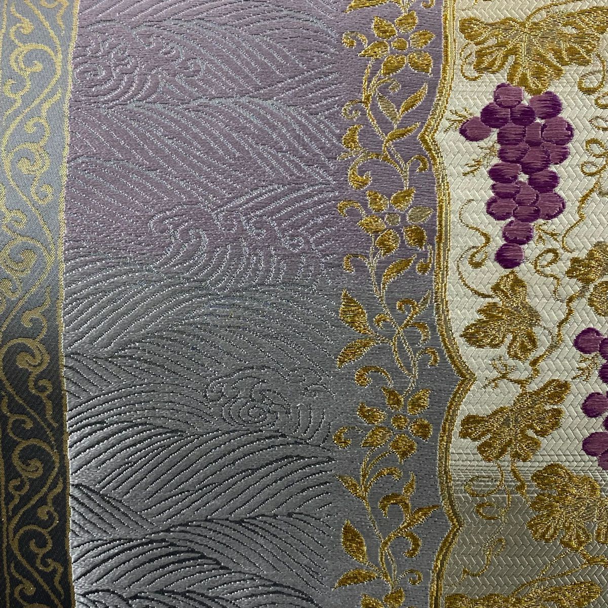 【美品】 袋帶 逸品級 じゅらく 落款あり 紫華麗人 葡萄 波 金糸 唐織 薄紫 お太鼓柄 純蠶絲