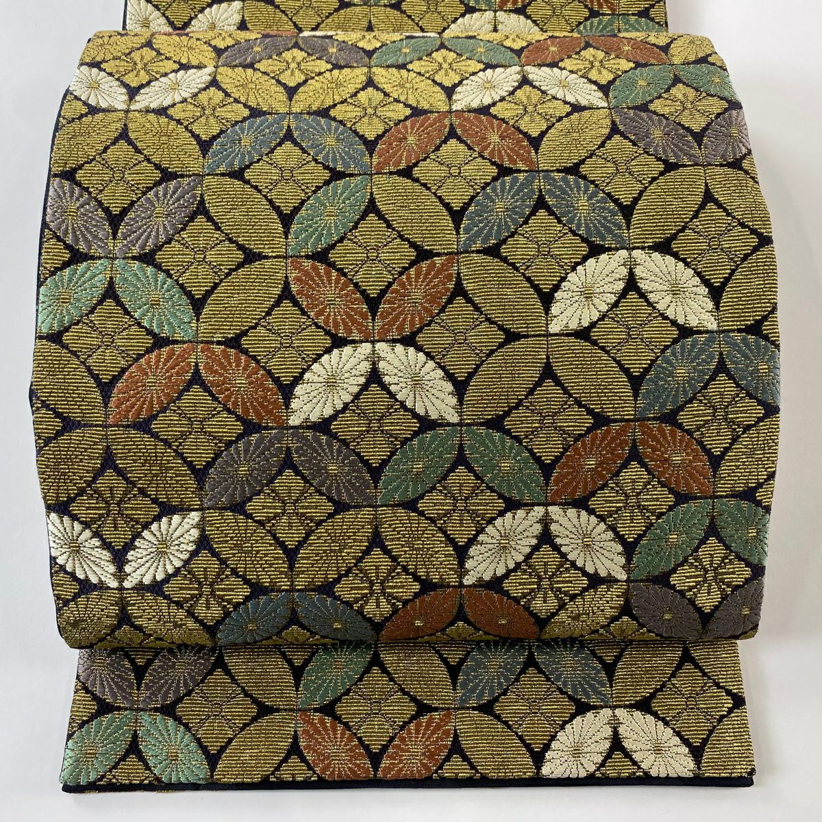 【美品】 袋帶 逸品級 手先二通り 花七寶 幾何學 金絲 金色 大鼓圖案 純蠶絲