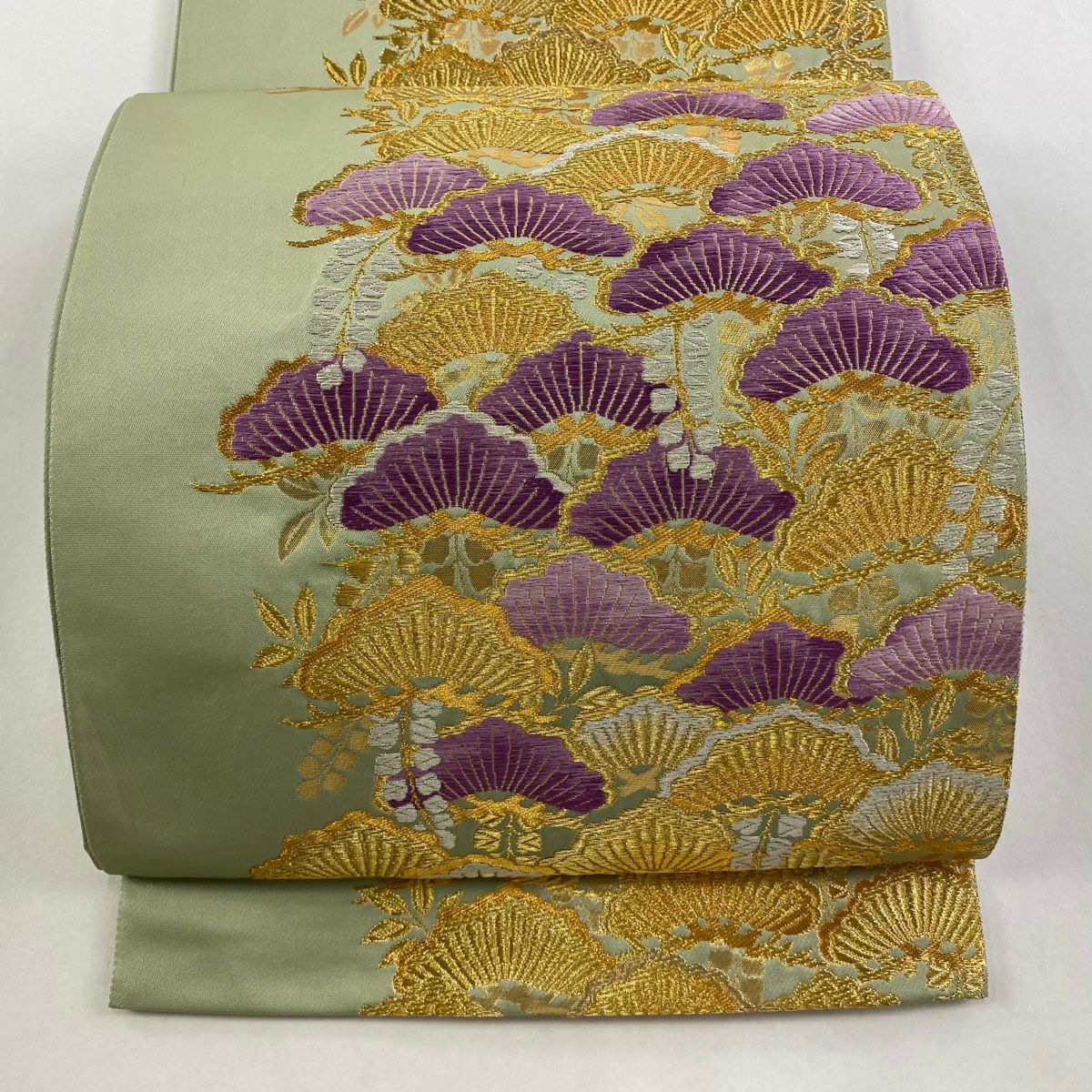 袋帶 逸品級 じゅらく 落款あり 帝王紫 曙蠶 松樹 藤 金絲 唐織 淺綠 お太鼓柄 純蠶絲