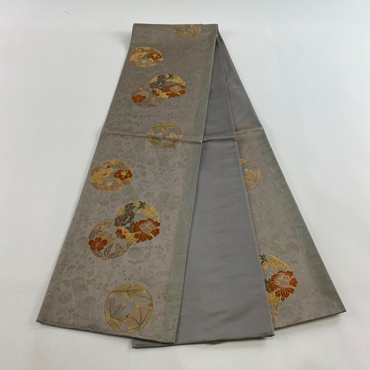 【美品】 袋帶 秀品級 奥野地秋草 花色舞金泥 花丸文 草花紋 金糸 金金箔 灰 深藍 六通 純蠶絲
