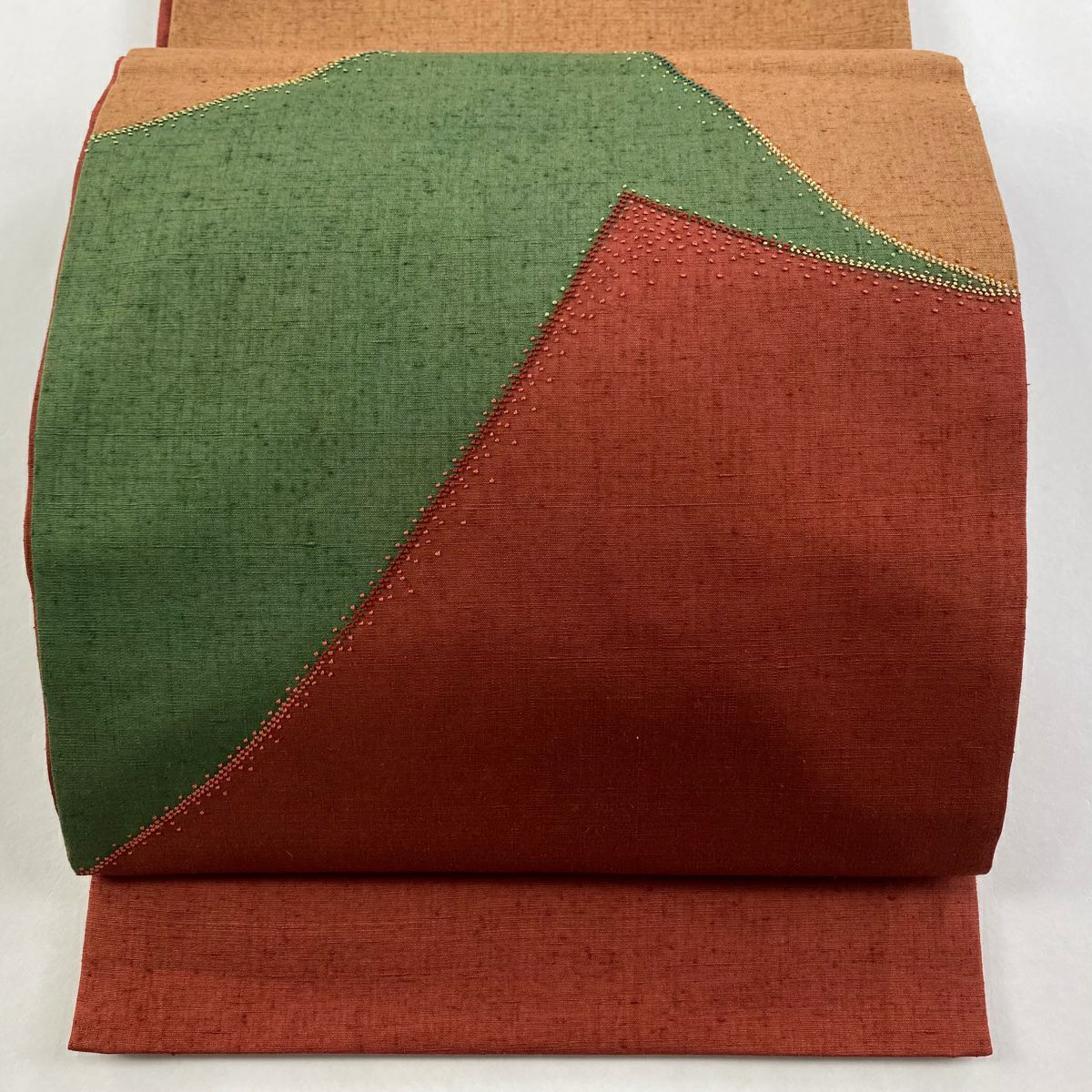 【美品】 袋帶 秀品級 紬織織 幾何學 刺繡 茜 紅色 お太鼓圖案 純蠶絲