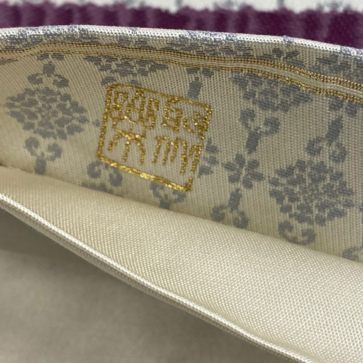 【美品】 袋帶 逸品級 じゅらく 落款あり 帝王紫 華紋 草花紋 金銀彩 金金箔 灰白 六通 純蠶絲