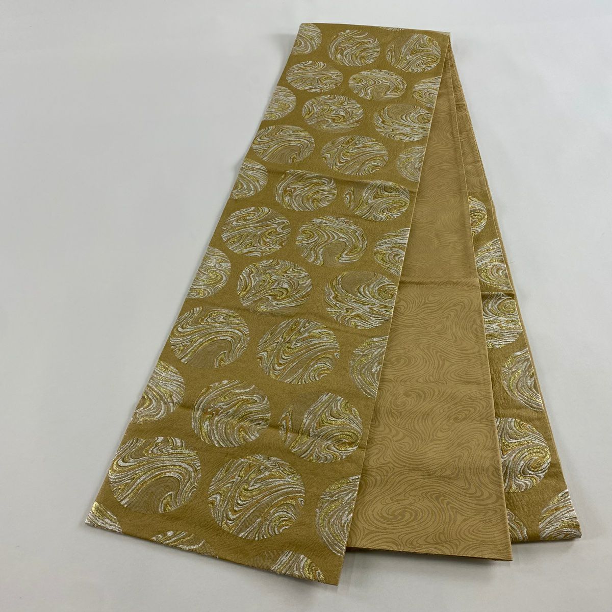 【美品】 袋帶 秀品級 清映粋薫風 圓文 幾何學圖案 金絲 金金箔 淺茶 六通 純蠶絲
