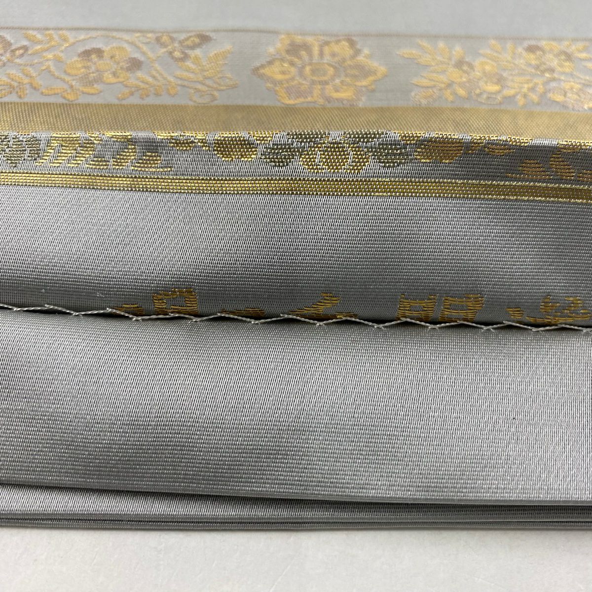 【美品】 袋帶 秀品級 華紋 花唐草紋 金金箔 灰色 大鼓圖案 純蠶絲