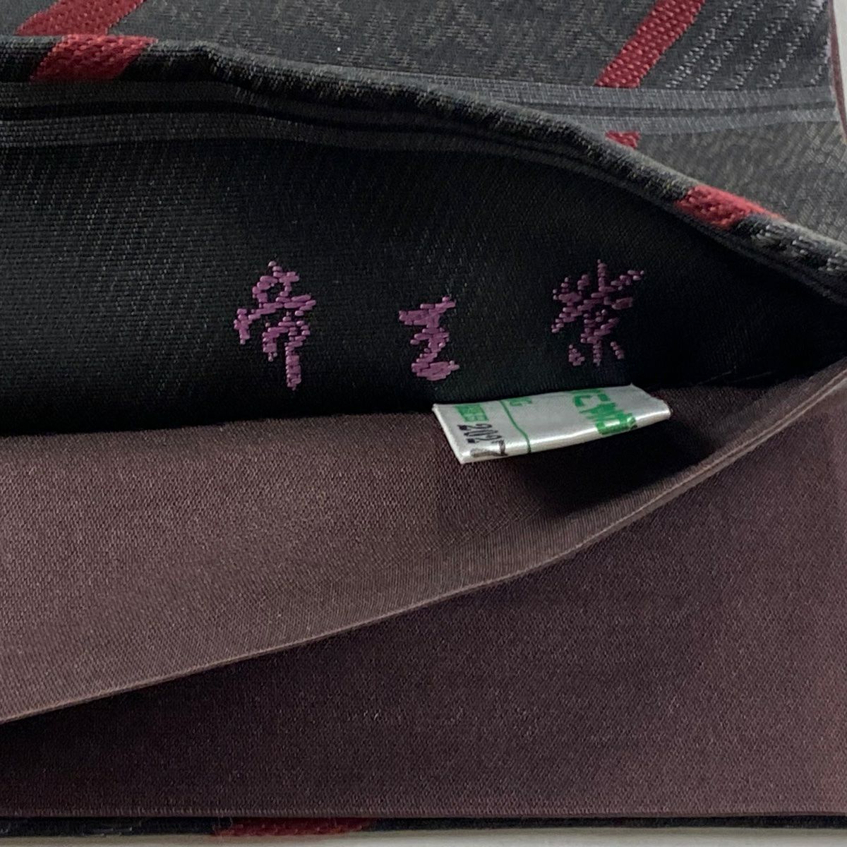 【美品】 袋帶 逸品級 じゅらく 落款あり 証紙あり 帝王紫 毛絨風 花 幾何學 金絲 墨色 大鼓圖案 純蠶絲