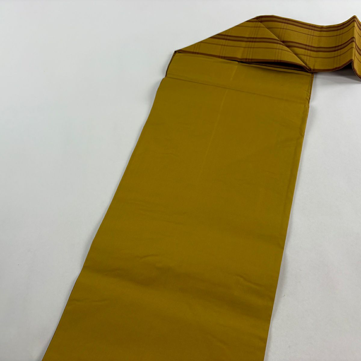 【美品】 名古屋帶 逸品級 紬織織 格子 山吹茶 純蠶絲