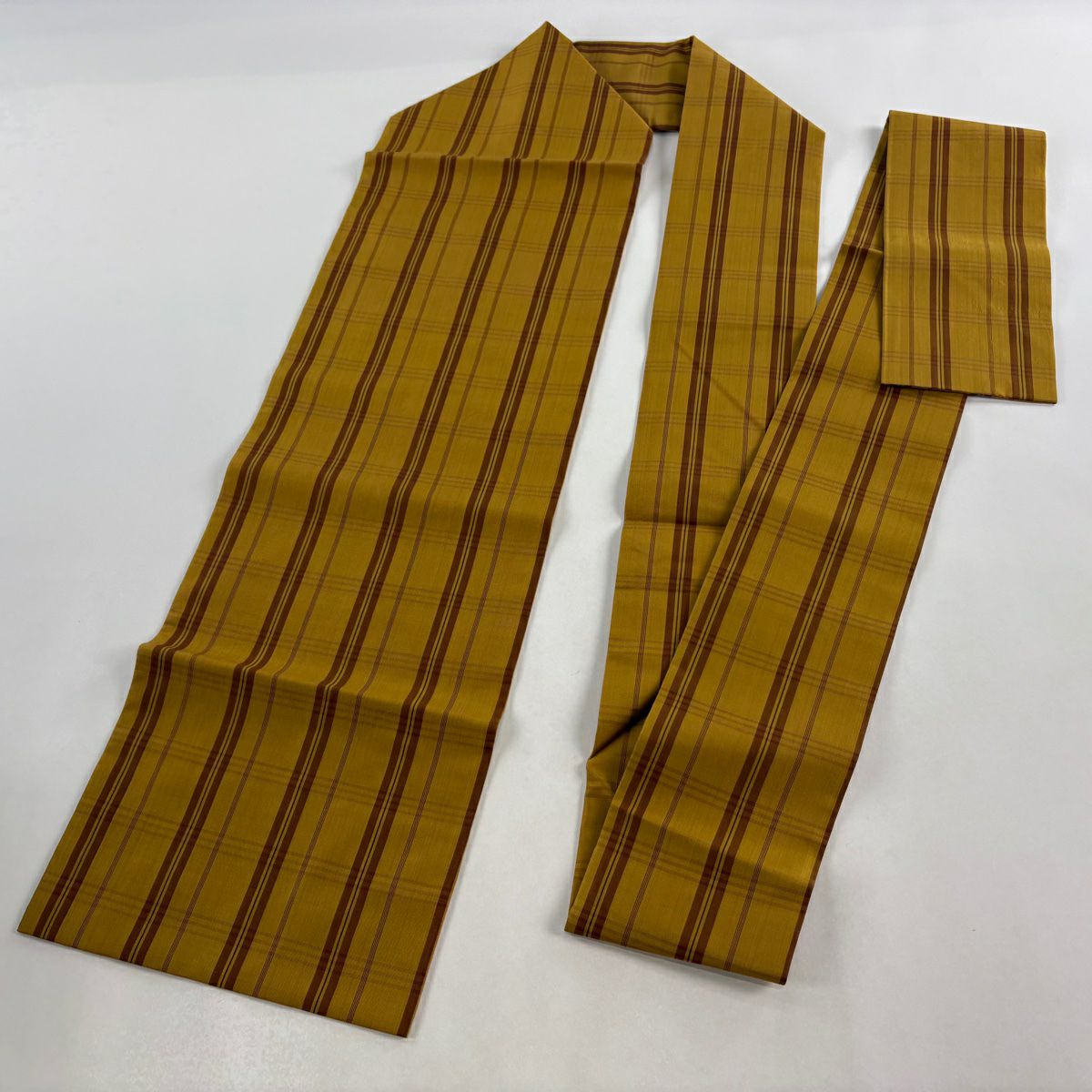 【美品】 名古屋帶 逸品級 紬織織 格子 山吹茶 純蠶絲