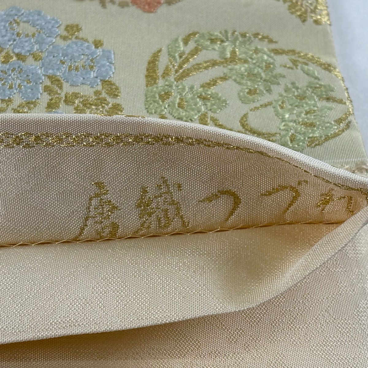 【美品】 袋帶 名品級 唐織織錦 御印文 段紋 金絲 米色 六通 純蠶絲