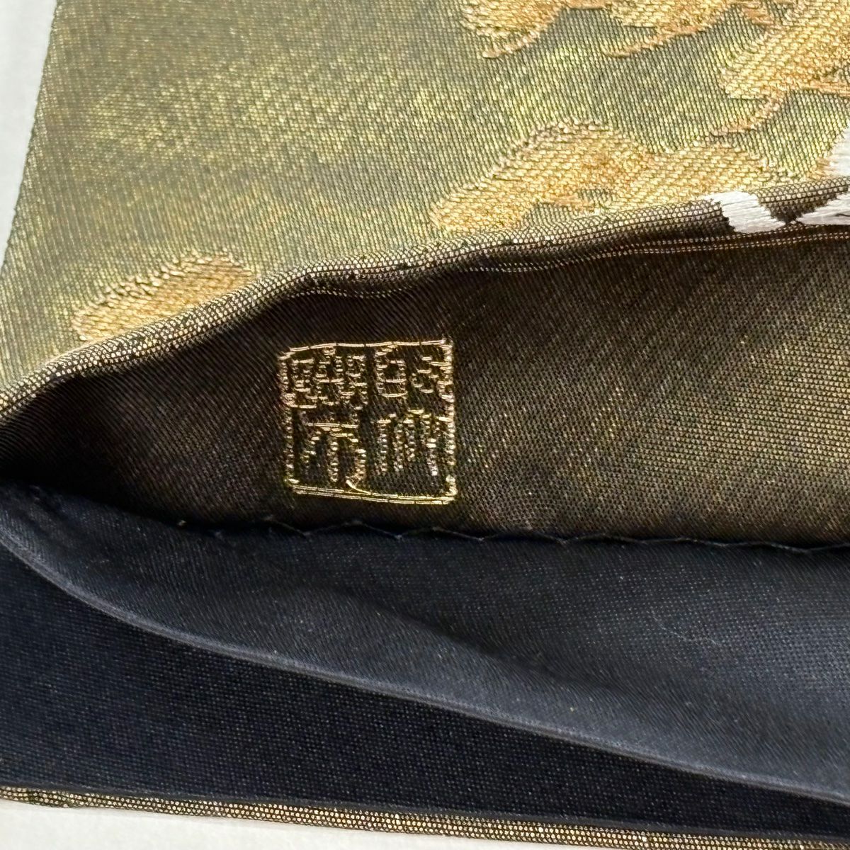 袋帶 逸品級 じゅらく 落款あり 帝王紫 色紙 草花紋 金糸 金金箔 金茶 六通 純蠶絲