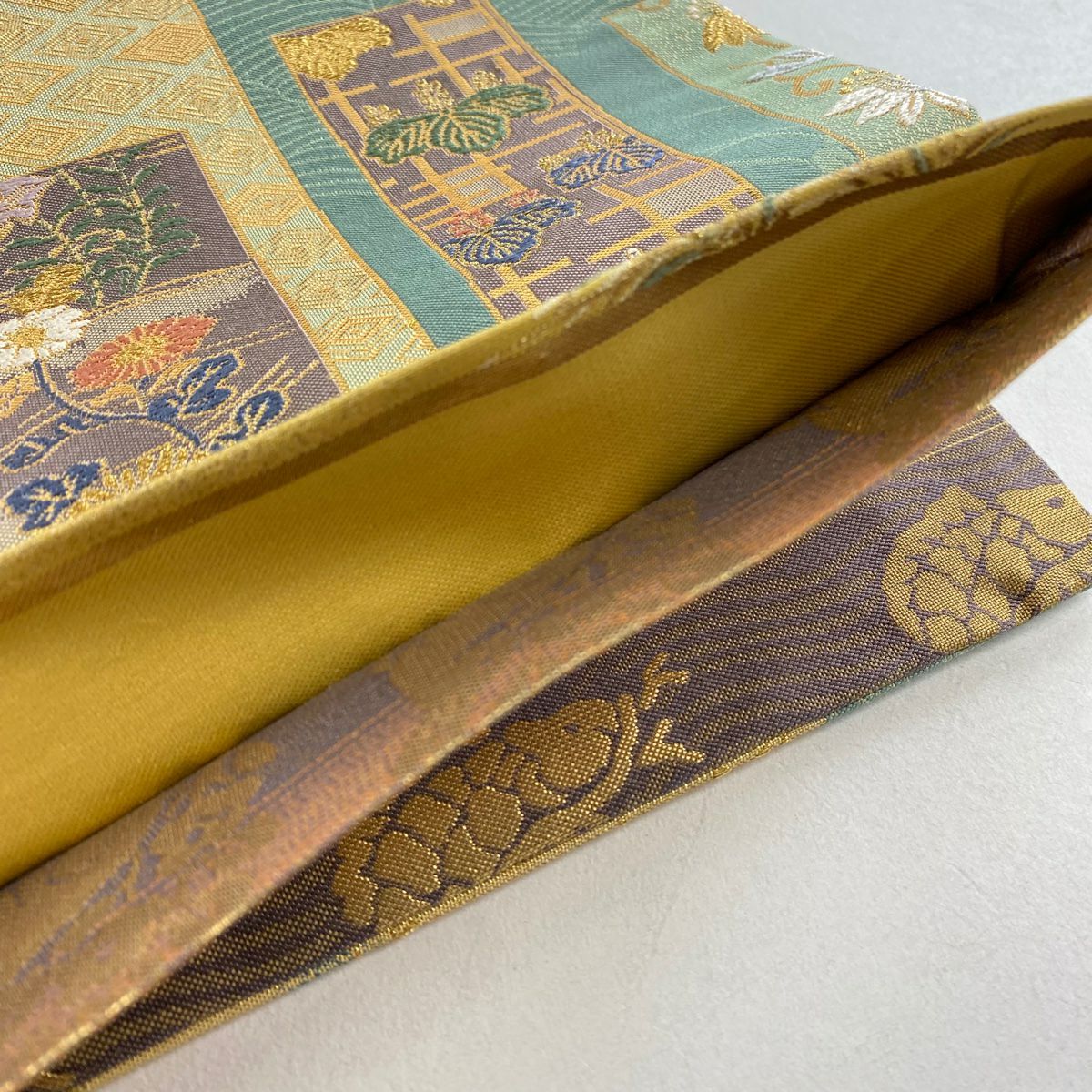 【美品】袋帶 名品級 扇子面 草花紋 金糸 金金箔 淺綠 お太鼓圖案 純蠶絲