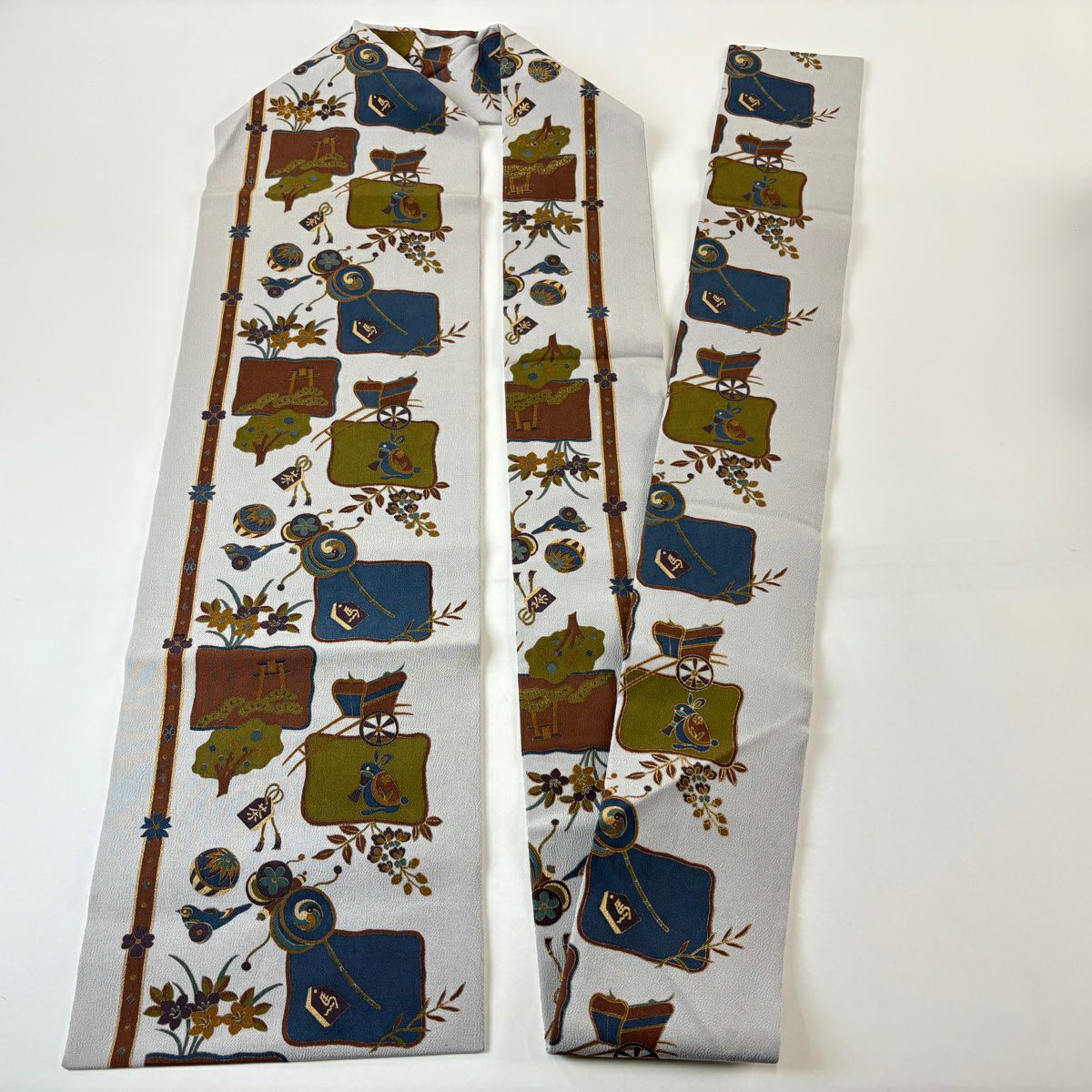 名古屋帶 秀品級 玩具 草花紋 金彩裝飾 縮緬 灰 純蠶絲