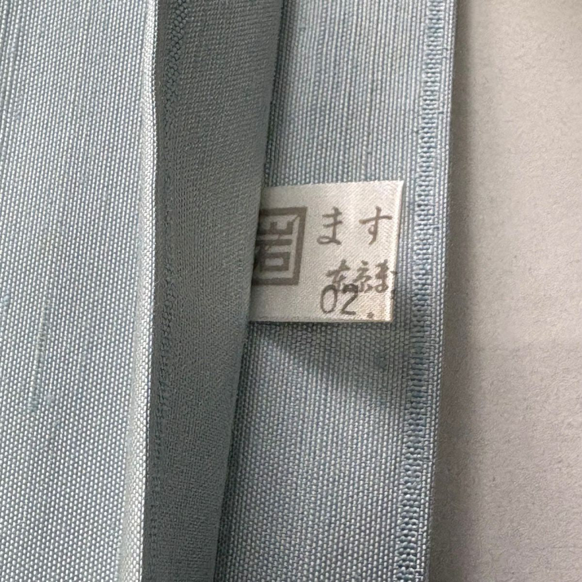 【美品】 袋帶 逸品級 落款あり 上島洋山 能州紬織 風景 文字 水色 お太鼓柄 純蠶絲