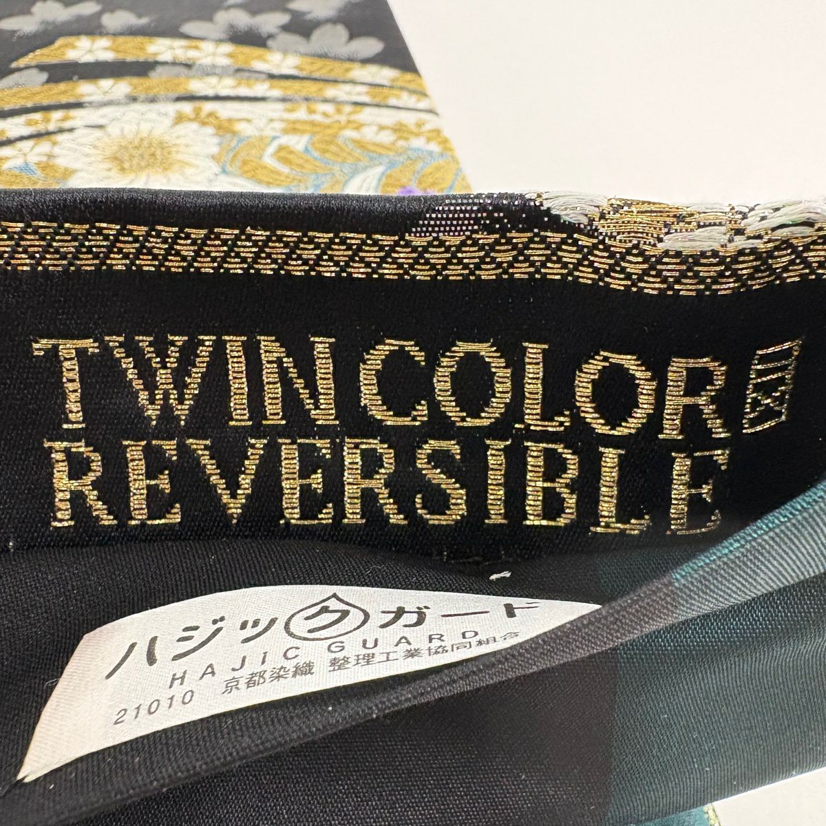 【美品】 袋帶 秀品級 萌希 TWINCOLORE 可逆 櫻花 草花紋 唐織 金金箔 黑 六通 純蠶絲
