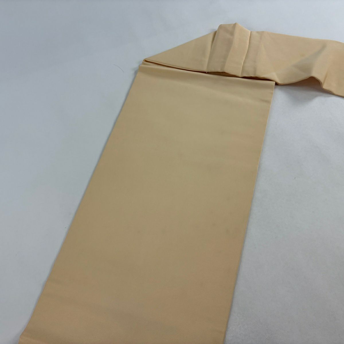 【美品】 名古屋帶 逸品級 落款あり 犬 鈴 漸層 薄橙 純蠶絲