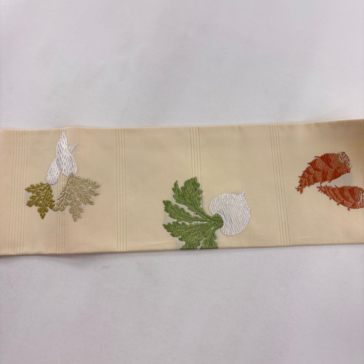 【美品】 名古屋帶 逸品級 蔬菜 唐織 奶油色 純蠶絲