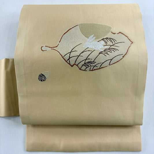 【美品】 名古屋帶 名品級 兔子 葉子圖案 金金箔 金絲 淺橙色 純蠶絲