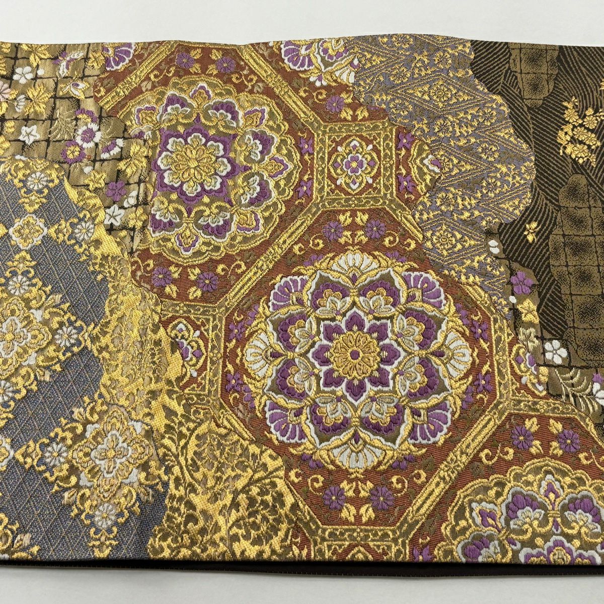 【美品】 袋帶 逸品級 じゅらく 落款あり 帝王紫 道長取 蜀江華紋 金金箔 金絲 焦茶 お太鼓柄 純蠶絲