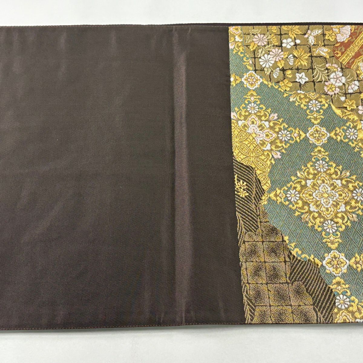 【美品】 袋帶 逸品級 じゅらく 落款あり 帝王紫 道長取 蜀江華紋 金金箔 金絲 焦茶 お太鼓柄 純蠶絲