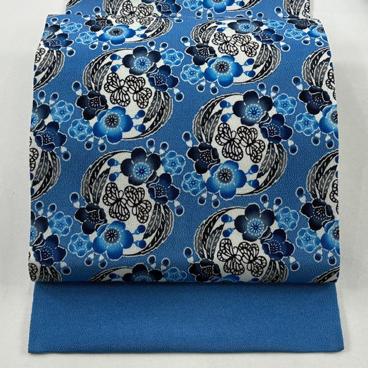 名古屋帶 逸品級 城間榮順 落款 伊と幸 梅花 蝶 琉球紅型 縮緬 水色 純蠶絲