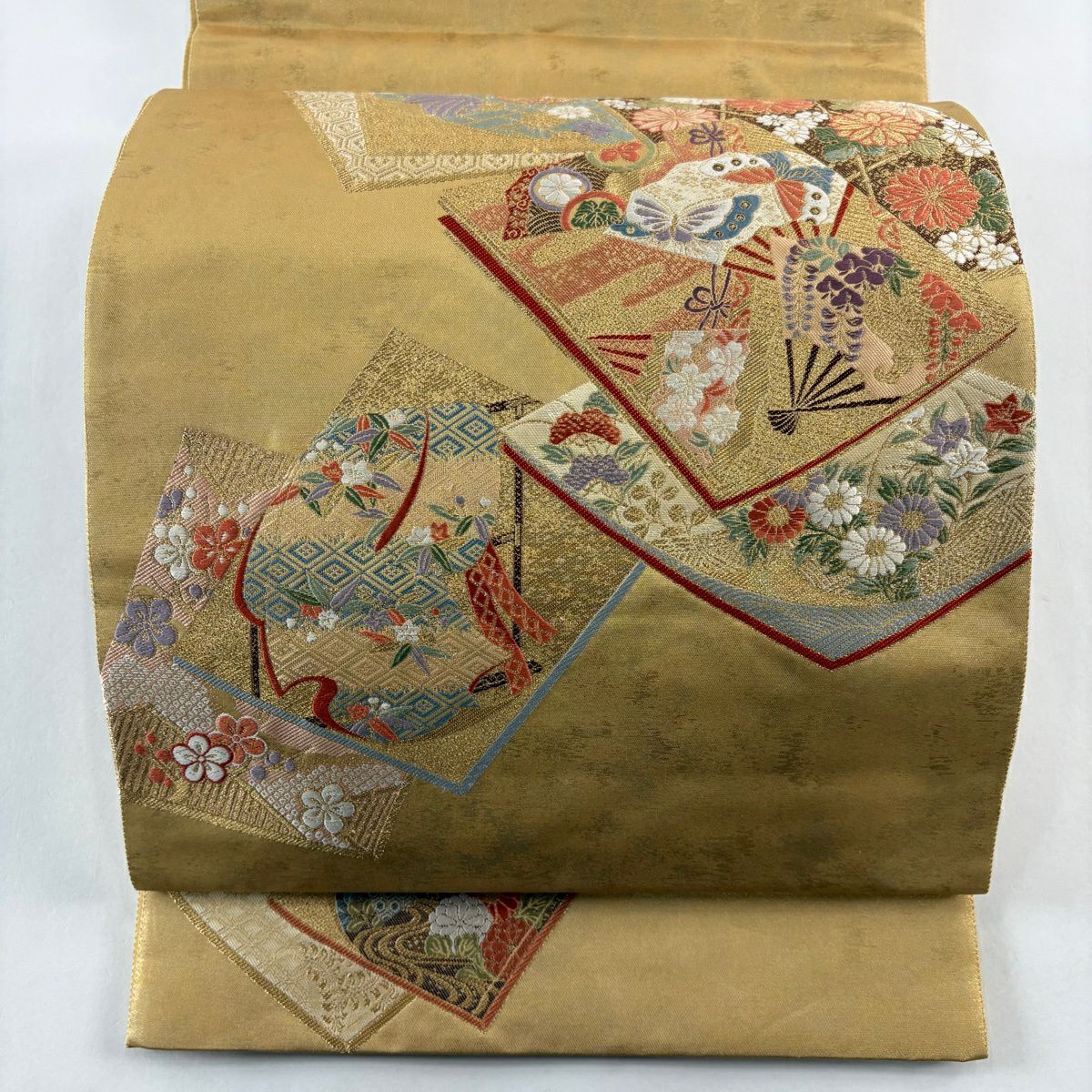 【美品】 袋帶 秀品級 冊子 草花紋紋 金金箔 金絲 金茶 お太鼓柄 純蠶絲