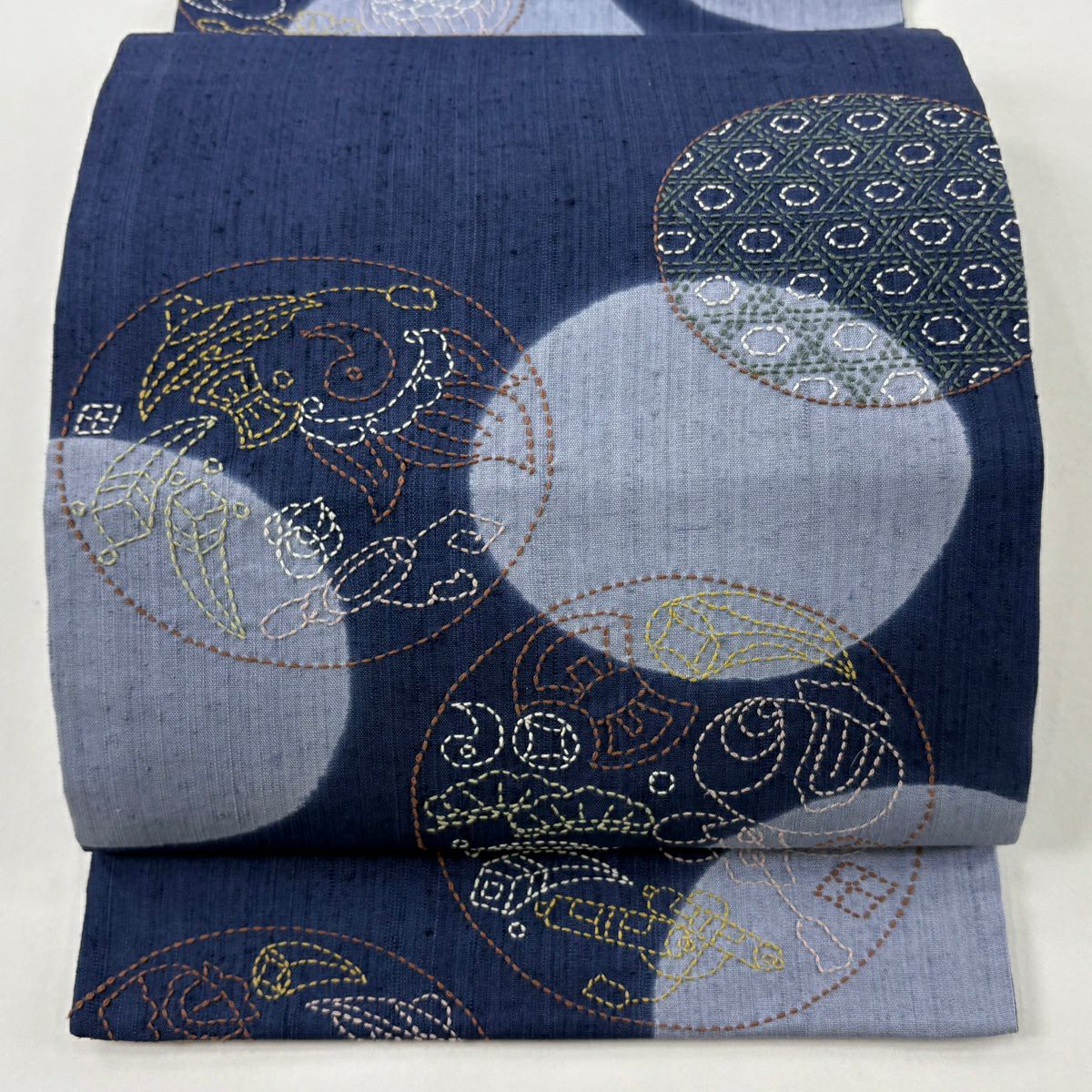 【美品】 袋帶 逸品級 紬織織 圓文 寶物滿載 刺繡 藍 六通 純蠶絲