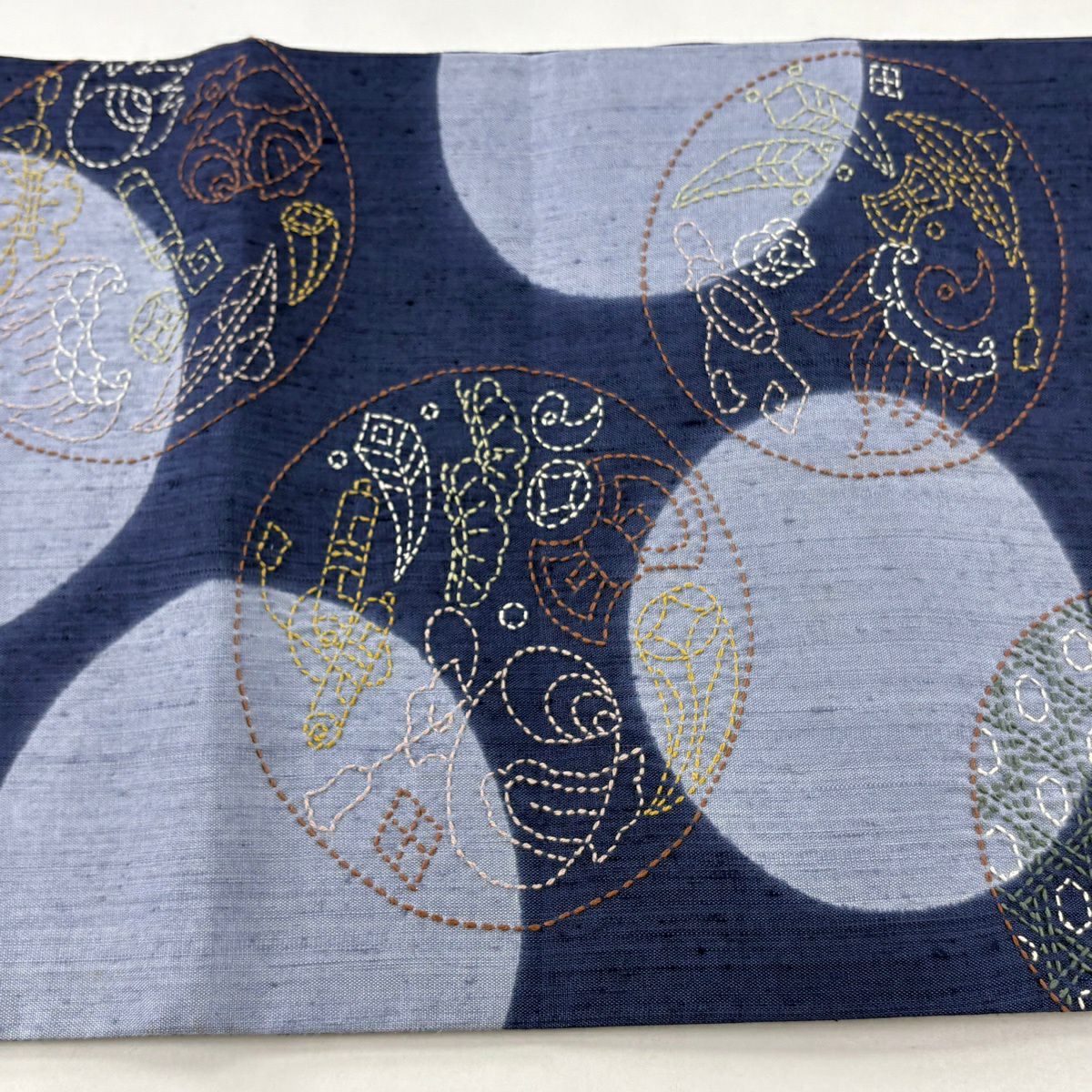 【美品】 袋帶 逸品級 紬織織 圓文 寶物滿載 刺繡 藍 六通 純蠶絲