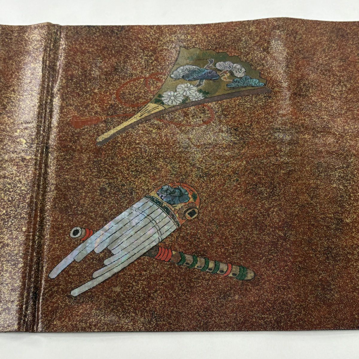 【美品】 袋帶 秀品級 樂器 扇子 螺鈿金金箔 紅茶 お太鼓圖案 純蠶絲