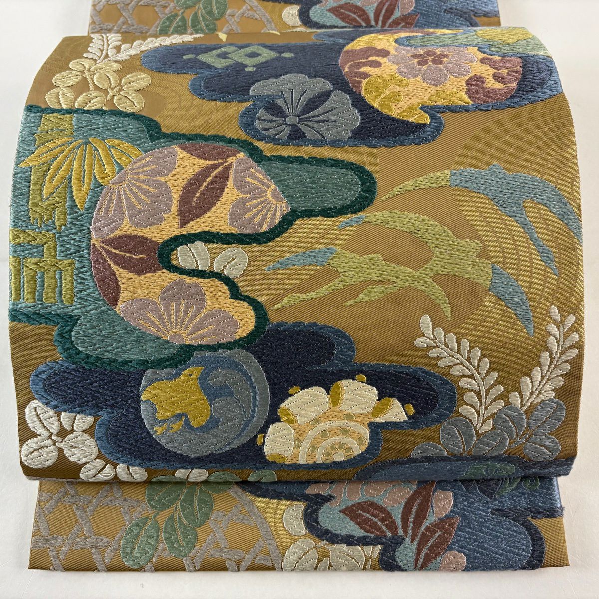 【美品】 袋帶 名品級 慶雲雁金 草花紋 流水 唐織 金金箔 黃土 深色 六通 純蠶絲