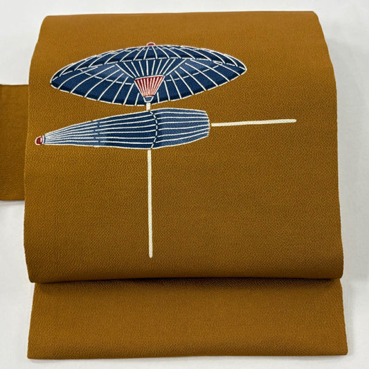 名古屋帶 逸品級 栗山吉三郎 落款 番傘 縮緬 紅型 茶 純蠶絲