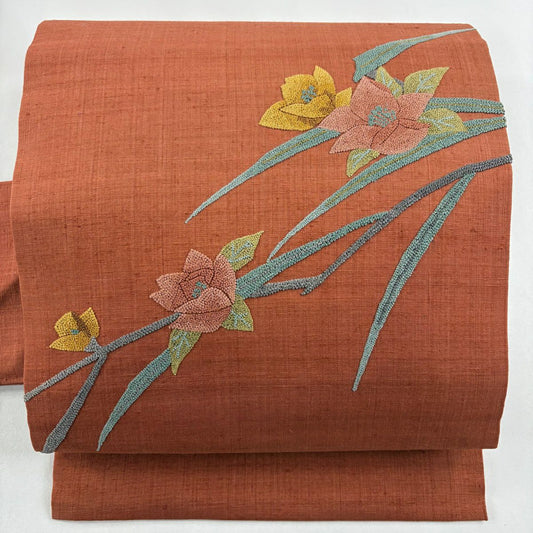 【美品】名古屋帶 秀品級 紬織織 草花紋紋 相良刺繡 橙色 純蠶絲