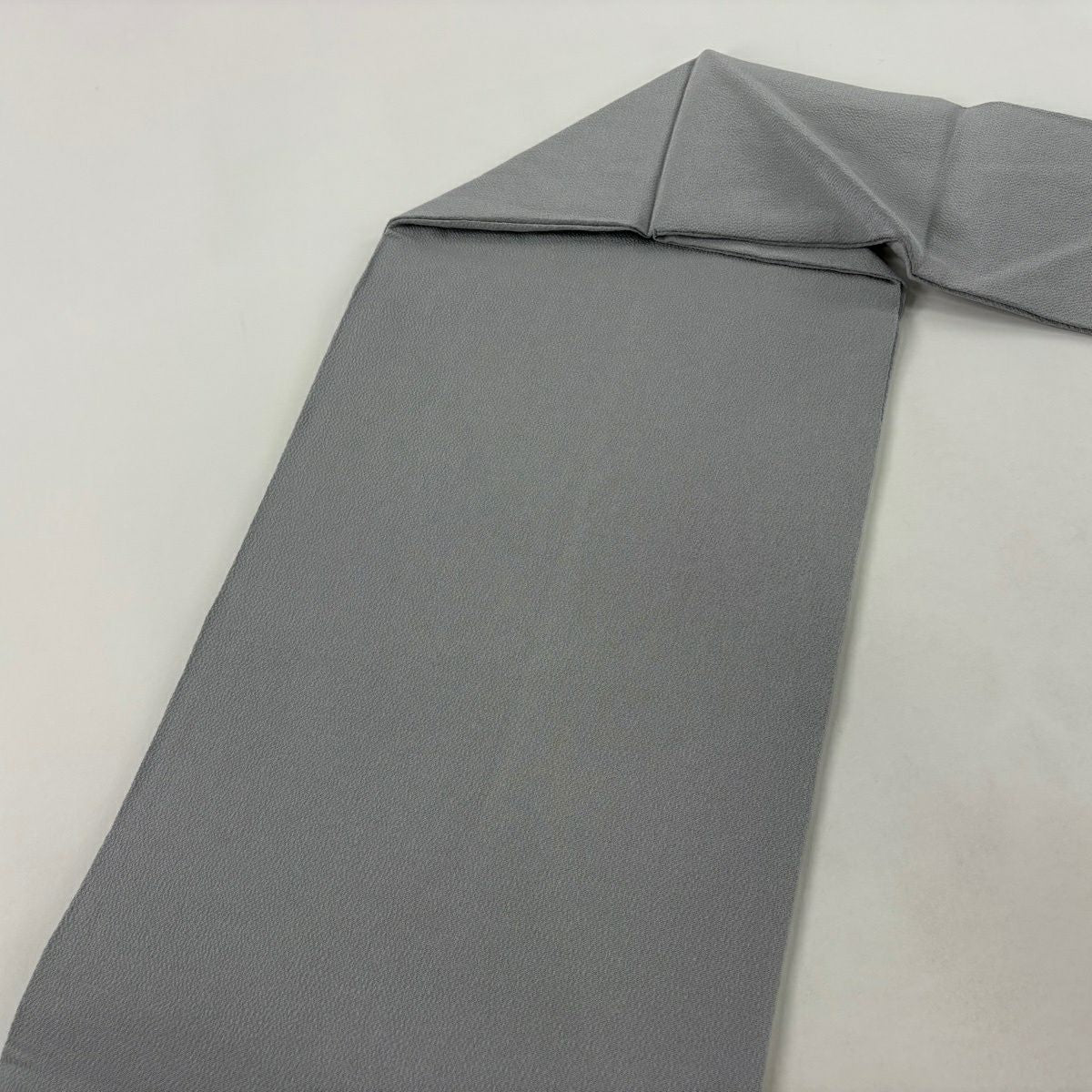 【美品】 名古屋帶 逸品級 羽田登喜 落款 鴛鴦 葉紋 金銀彩 絞織 青灰色 純蠶絲