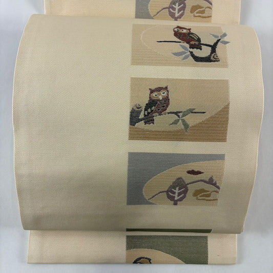 【美品】 開口名古屋帶 逸品級 貓頭鷹 枝葉 米色 純蠶絲