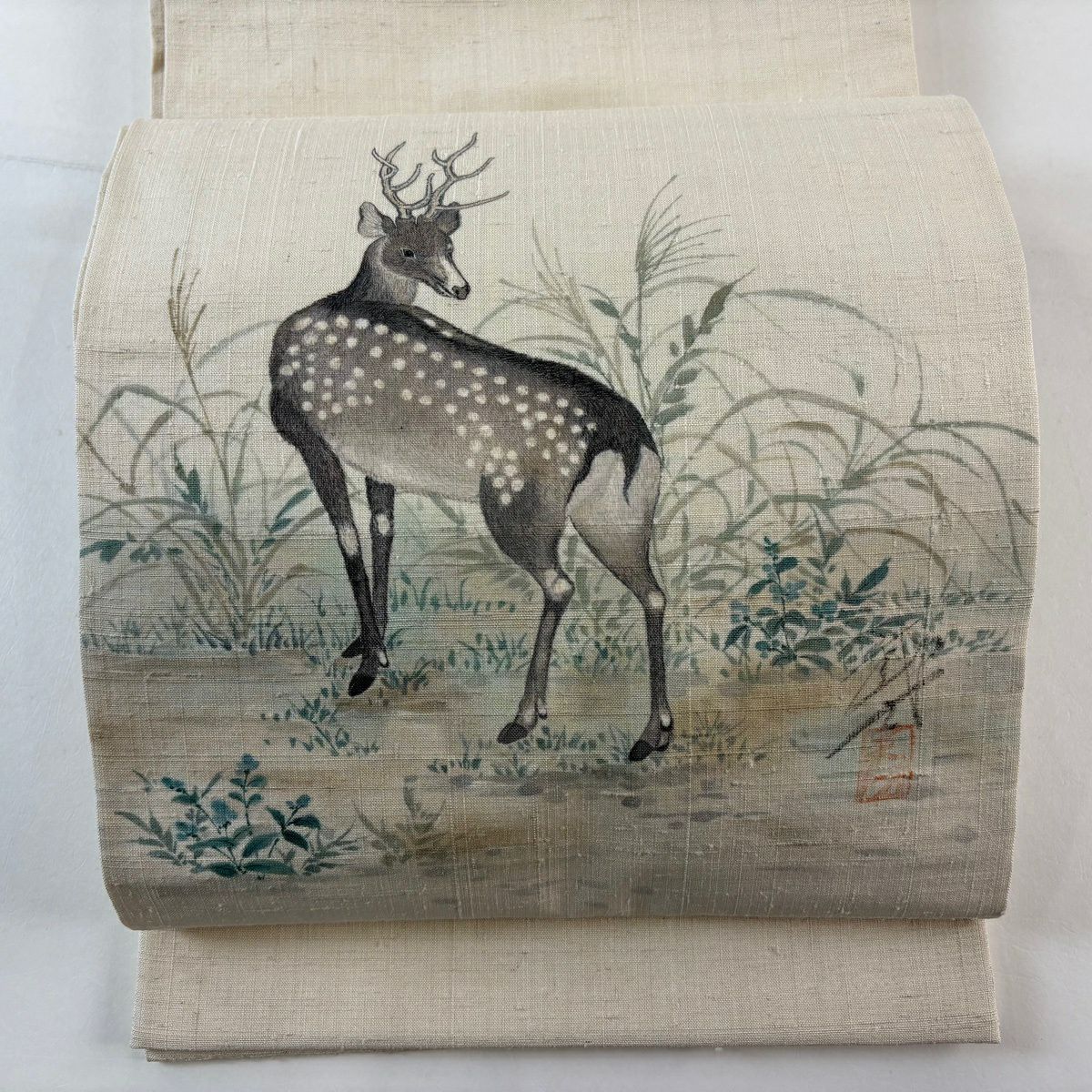 【美品】 袋帶 秀品級 落款あり 紬織織 砂染 鹿 草花紋 淺咖啡色 お太鼓柄 純蠶絲