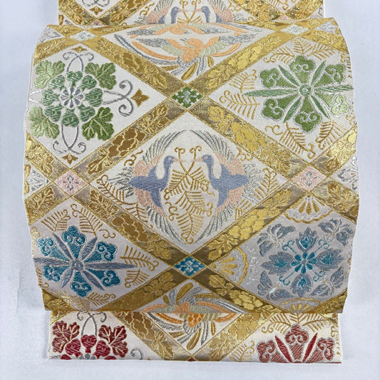 【美品】 袋帶 名品級 向鳥葉紋 金銀絲 唐織 米色 六通 純蠶絲