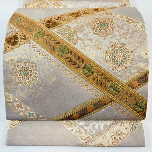 袋帶 名品級 じゅらく 落款あり 華紋 花唐草紋 金糸 金金箔 灰茶 お太鼓柄 純蠶絲