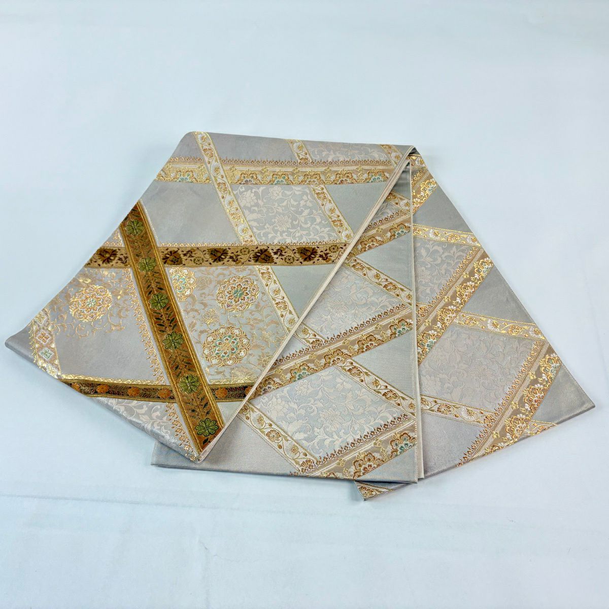 袋帶 名品級 じゅらく 落款あり 華紋 花唐草紋 金糸 金金箔 灰茶 お太鼓柄 純蠶絲
