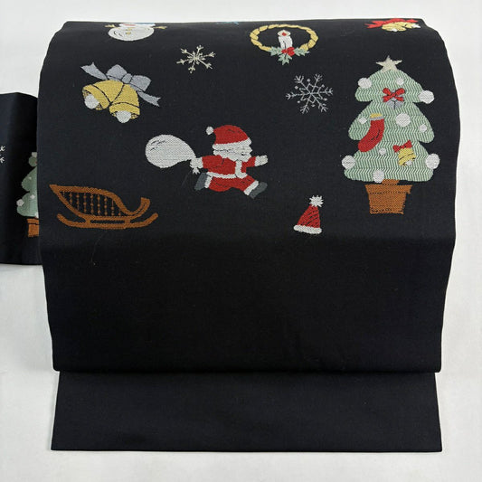 【美品】名古屋帶 逸品級 聖誕節 聖誕老人 黑 純蠶絲