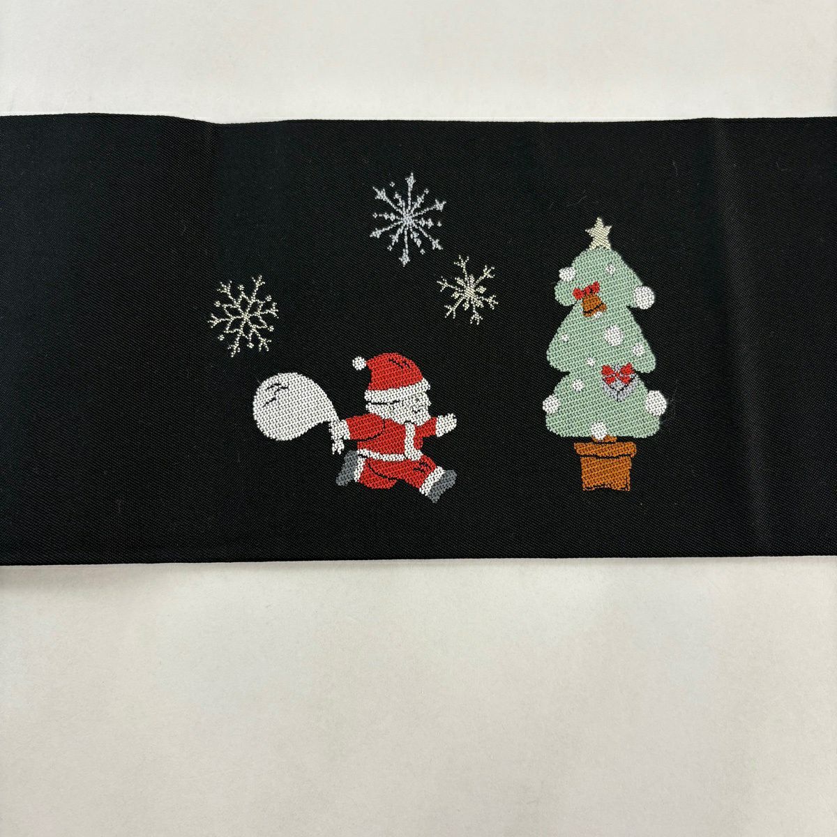 【美品】名古屋帶 逸品級 聖誕節 聖誕老人 黑 純蠶絲