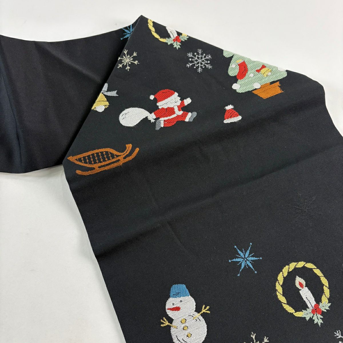 【美品】名古屋帶 逸品級 聖誕節 聖誕老人 黑 純蠶絲